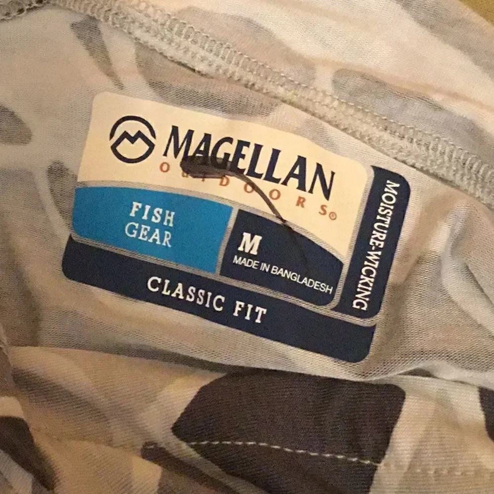 MEGELLAN moisture wicking lightweight pull over in medium